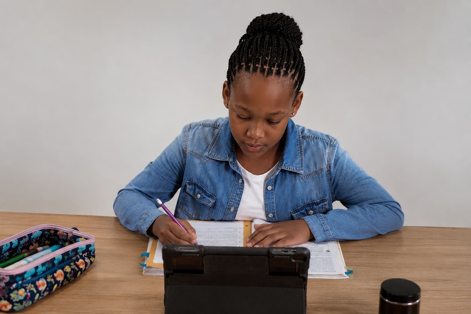 Student studying with Teach Academy